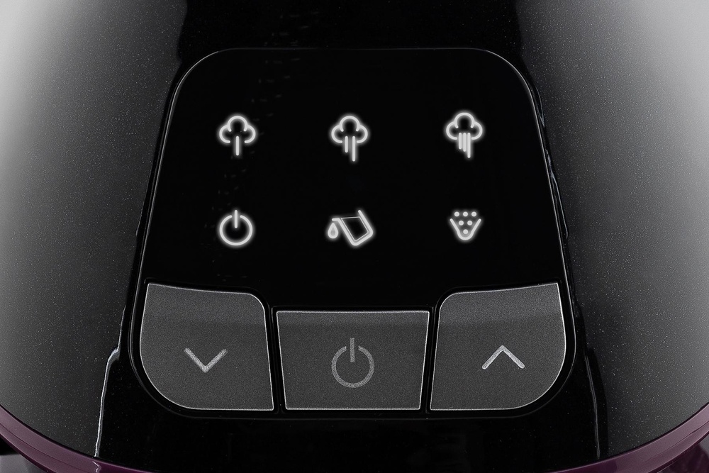 Panou de control negru cu pictograme iluminate și trei butoane cu săgeți și pornire.